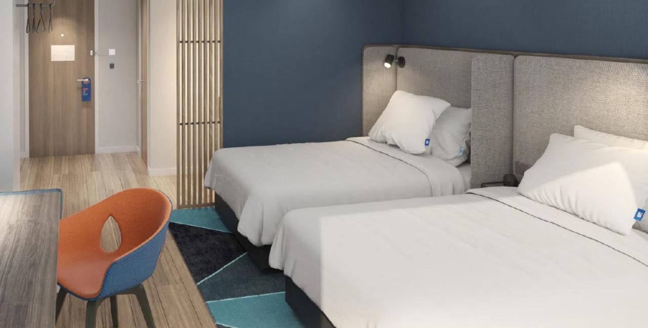 Holiday Inn Express Shanghai Huijin By Ihg Esterno foto